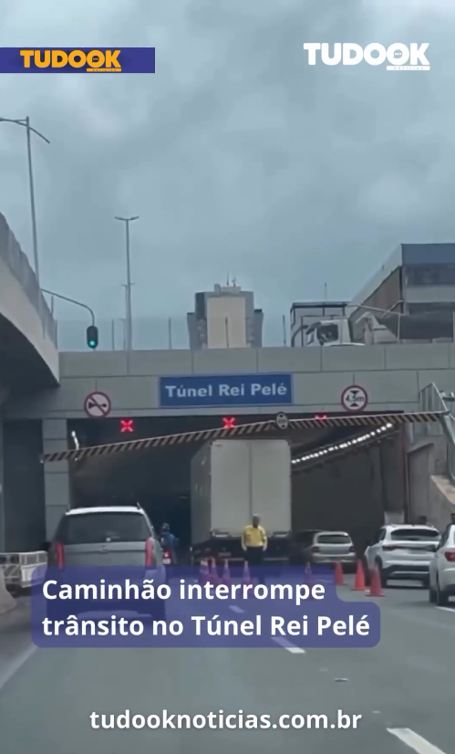 Caminhão interrompe trânsito no Túnel Rei Pelé devido a restrições de altura